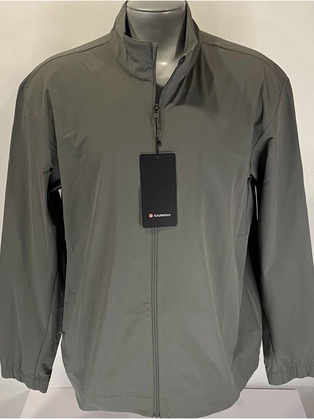 Lululemon zeroed in track jacket.  Mens XXL.  Sage Green appears gray.  New